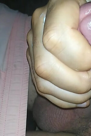 Masturbating